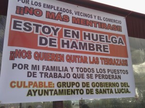 Cartel protesta de Santiago Vega